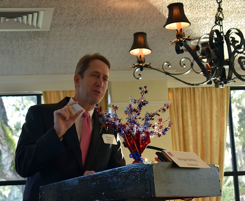 Panel moderator Morgan Bentley jokes with the crowd.