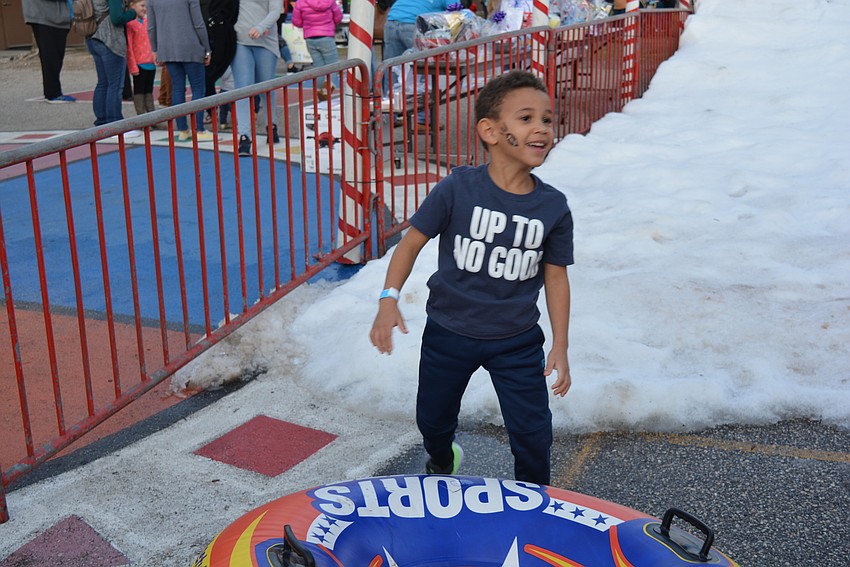 DeAndre Freedman, 8, loves sledding down the slide.
