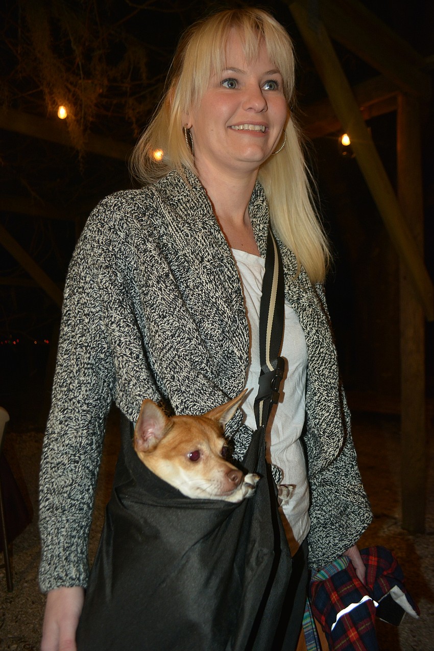 Board member Kristy Howland has an angel in her pocket in her rescue dog, Stanley.
