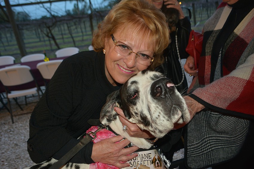 Lakewood Ranch's Maggie Abcunas tries to wrap her arms around Matilda.