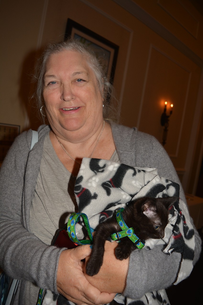 Venice resident Leann Fellmeth  shows off a 6-week-old from Cat Depot.