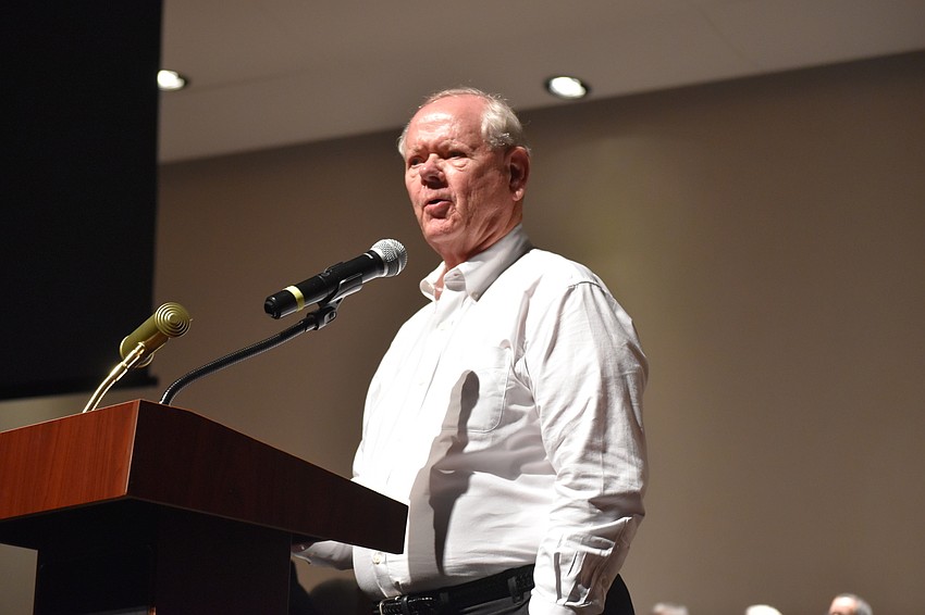 President of the Key Chorale Larry Patton helps to present the awards.