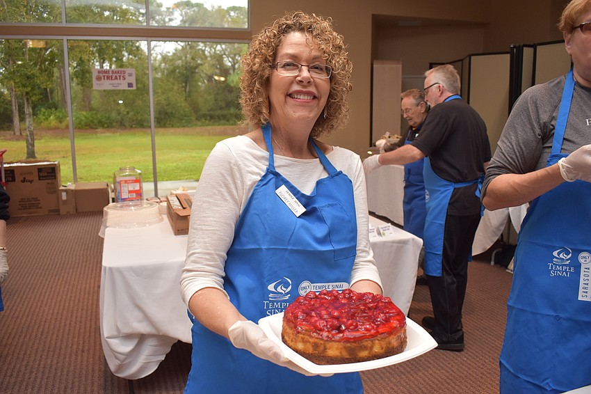 Florey Miller serves up the upside down strawberry cake.
