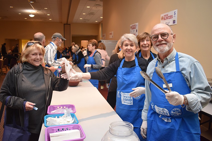 Jackie Levin is served by Jan Joseph, Itzel Lieberman and Fred Lasky.