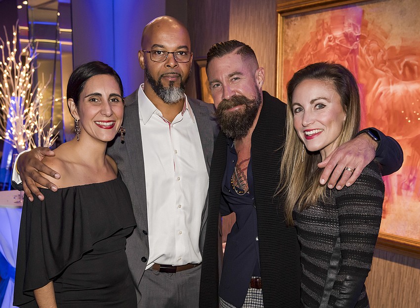 Leymis and Kavin Wilmott with Dan and Nicole Starostecki