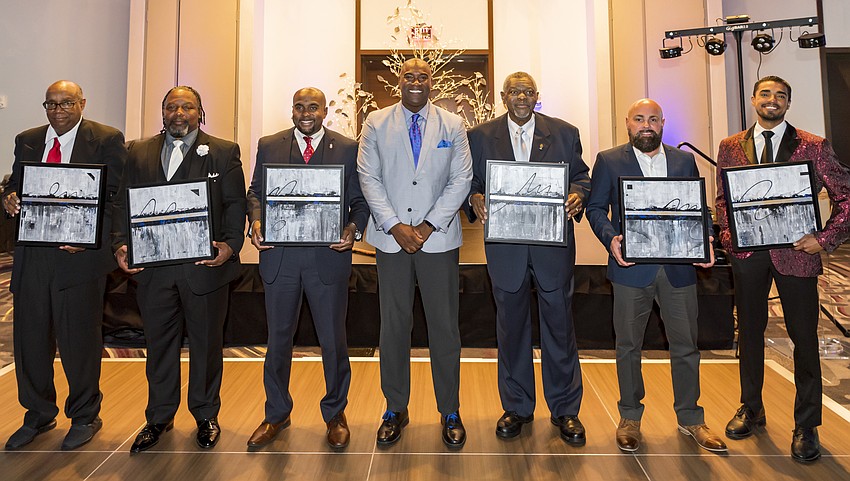 Honorees Robert Powell, Henry Blyden, Keenan Wooten, Co-Founder Neil Phillips and Honorees George Van Buren, Jose Lozada, Michael Mendez