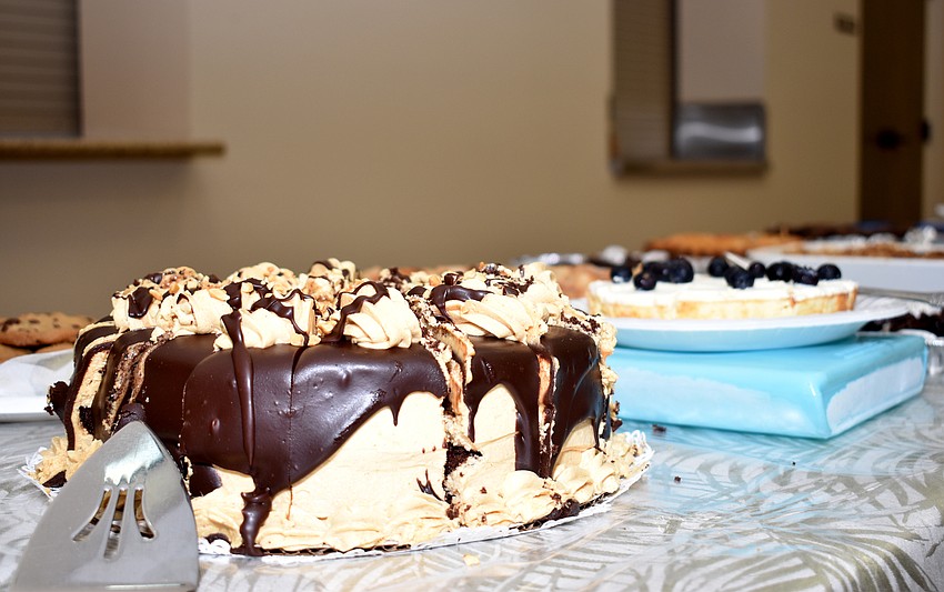 Dinner guests enjoyed various pies and cakes for dessert.