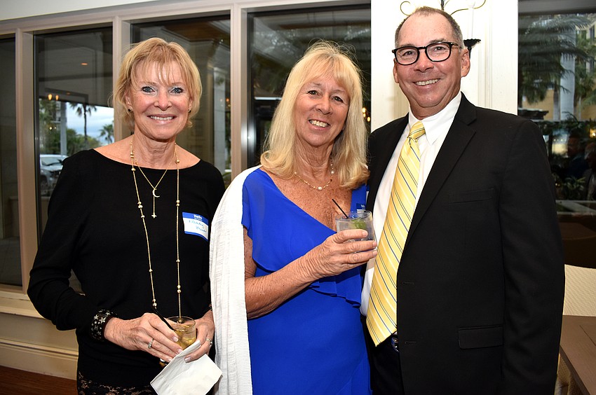 Nancy Mina and Jan and Chris Amstutz