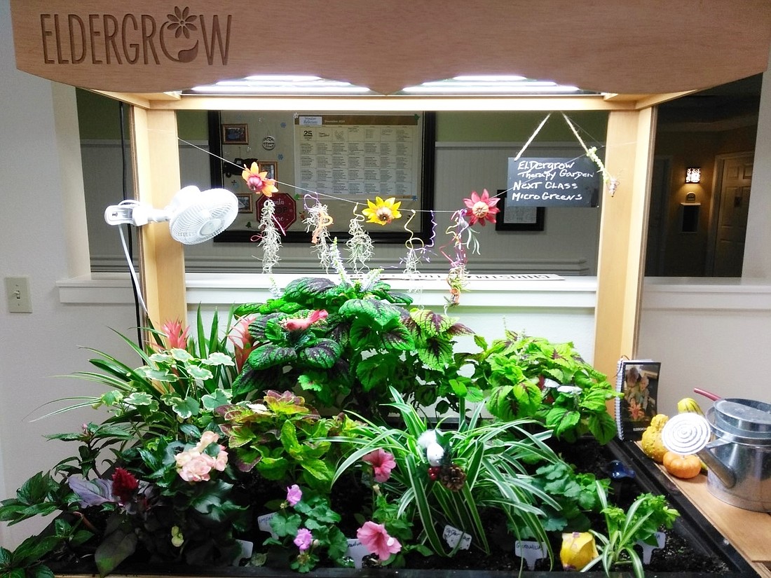 Windsor Reflections&#39; Eldergrow garden has flowers, herbs and other plants its residents tend to daily. Courtesy photo.