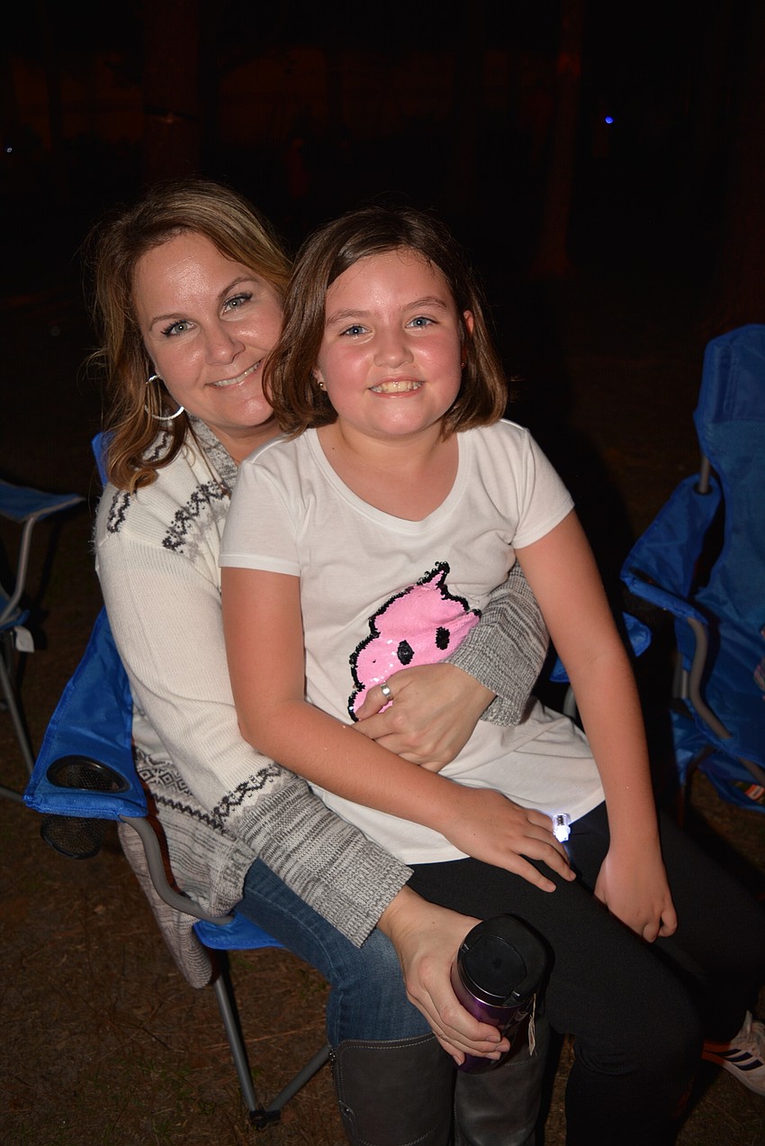 Rechele Hoffman and her third-grade daughter, Savannah,  have come to the bonfire since Savannah was in kindergarten.