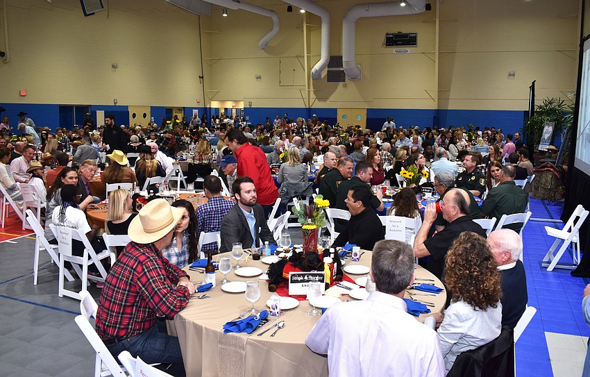 Guests filled the gymnasium of the Lee Wetherington Boys and Girls Club.