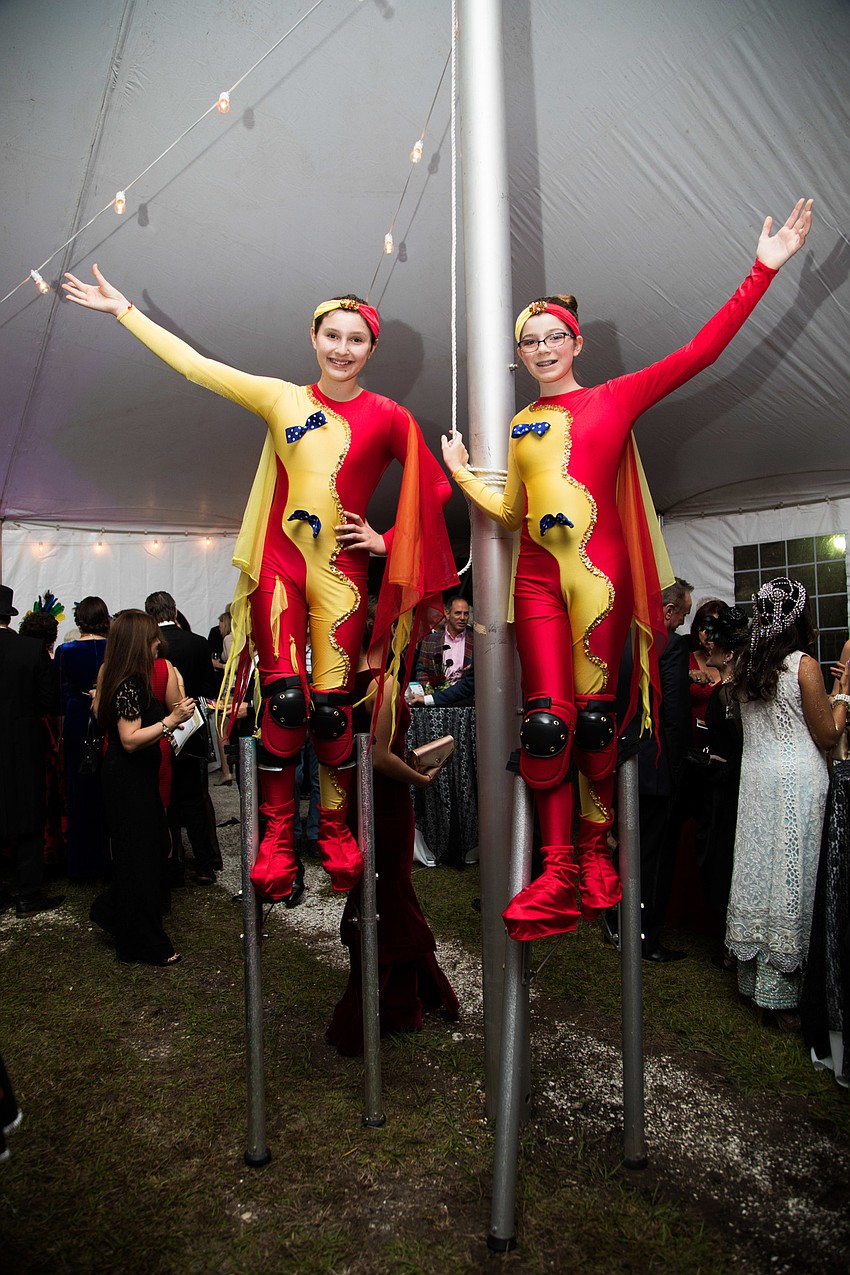 Circus acts greeted guests upon arrival.