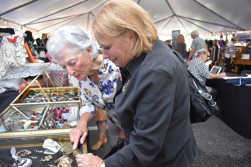 There were more expensive jewelry, behind the glass cases, that caught Nan Kaftan and Eileen Cantarelta.