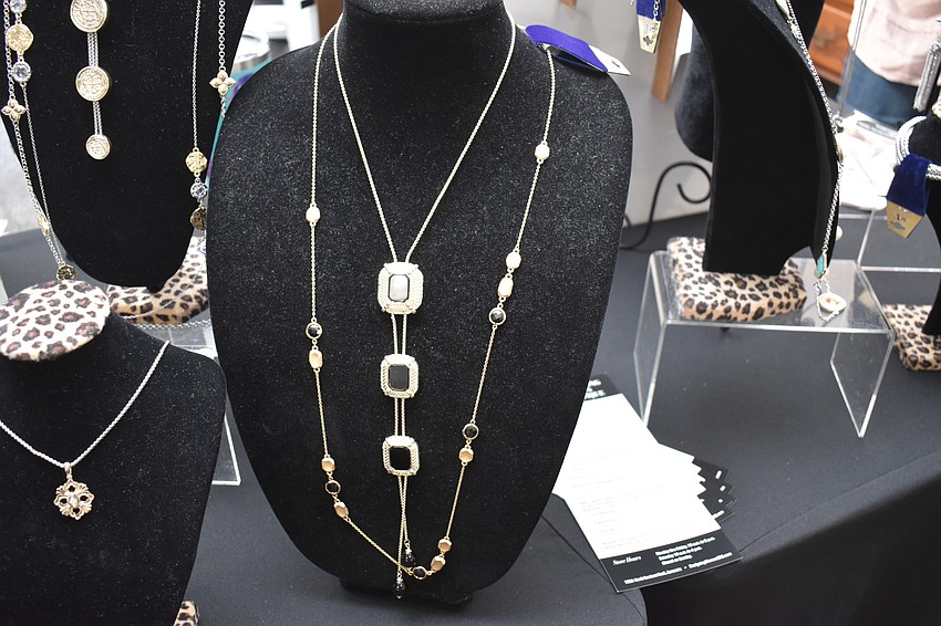 Jewelry from Designing Women are popular for the people in attendance.