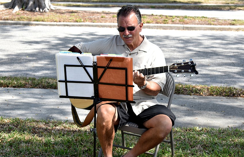 Paul Jaffe provides music as a backdrop to the festival.