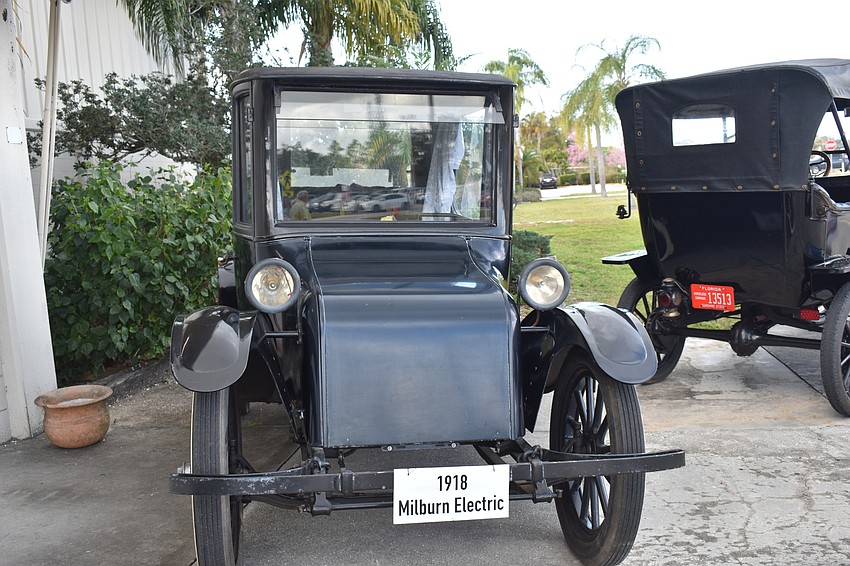 Old cars were situated outside Robarts Arena for event-goers to peruse.