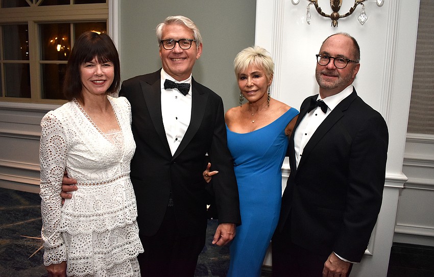 Janice Bini, Dean Scarborugh, and Chris and Kirk Voelker