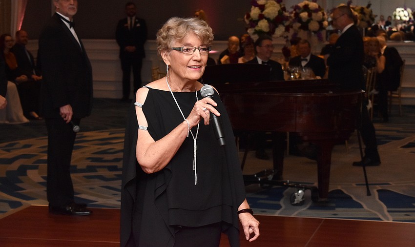 Board Chairwoman Syble DiGirolamo welcomes guests.