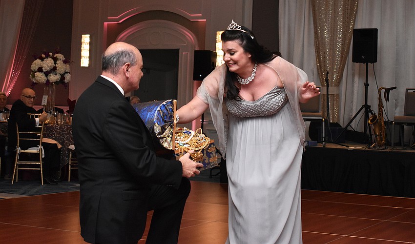 Soprano Rochelle Bard sings “Jewel Song” from “Gounod’s Faust” with special guest prop holder Executive Director Richard Russell.