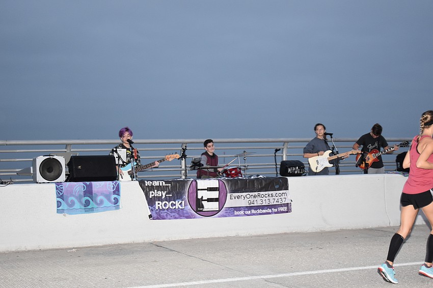 Everyone Rocks played for runners at the top of the bridge.