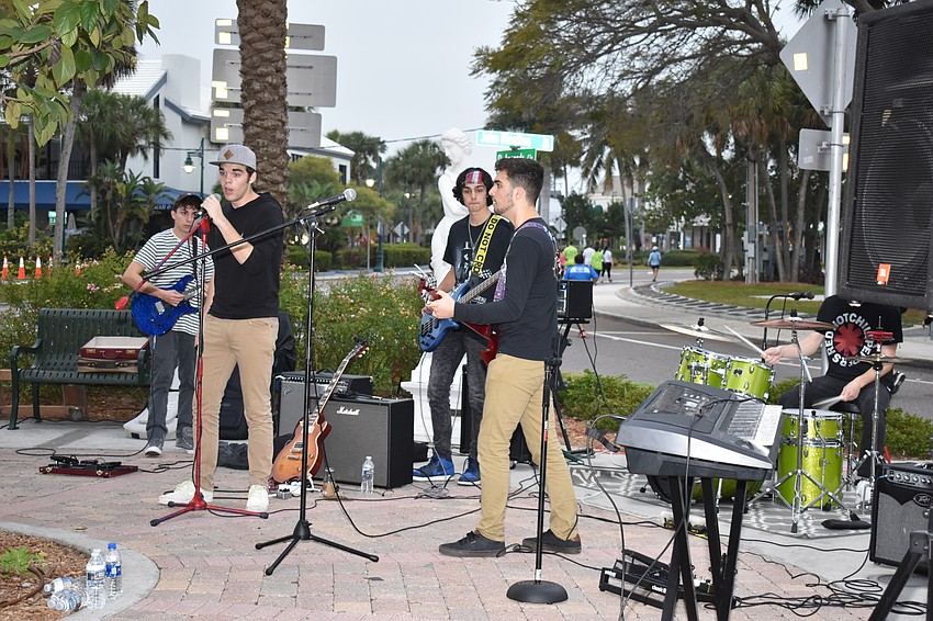 The band Mystery played pop-punk songs in St. Armand's Circle.