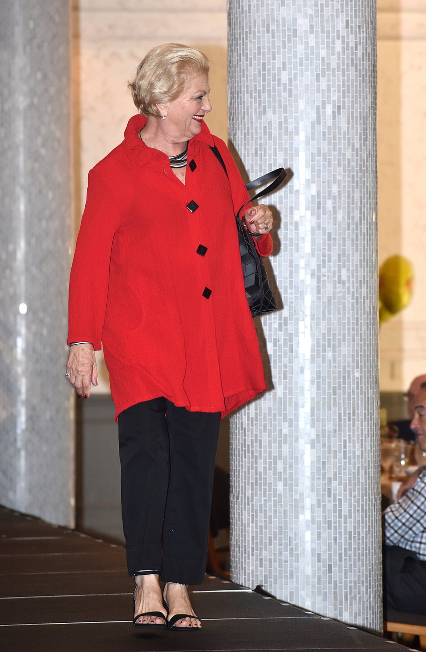 Carole Shaw kicks off the fashion show with a casual look from Natural Discoveries.