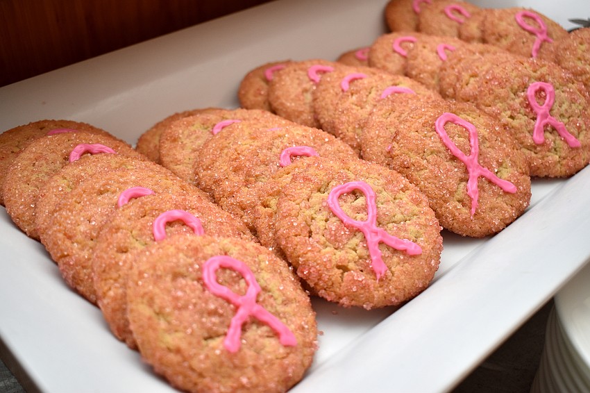 Themed treats, such as these cookies, along with pink-frosted cupcakes were set out for dessert.