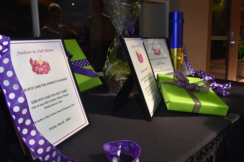 Items donated for the raffle include a Ritz-Carlton package and a shopping party at Foxy Lady.