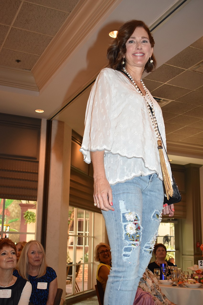Andrea Anderson takes her turn as a runway model.