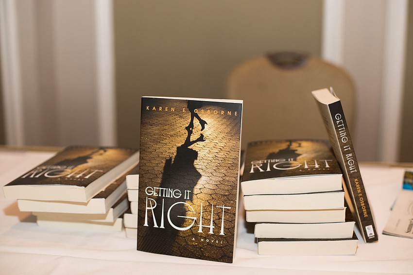 Karen Osborne signed copies of her book after the program.