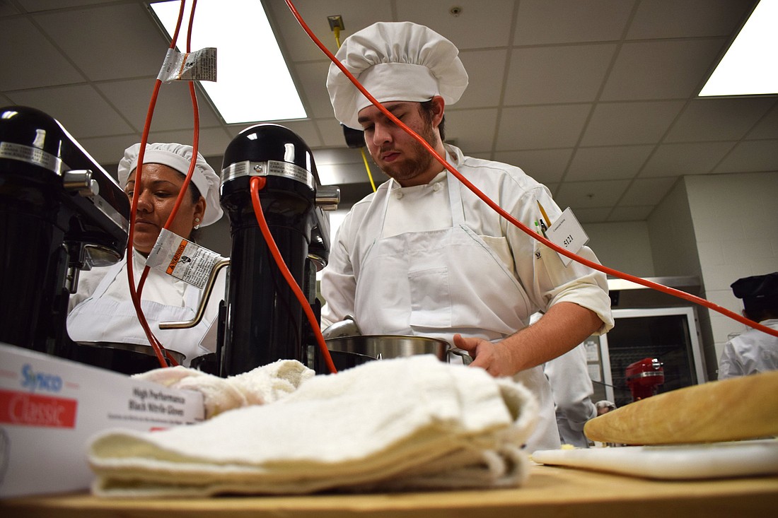 Manatee Technical College students Rocio Fonseca and Humdaan Saeed partcipate in the SkillsUSA commerical baking competition.