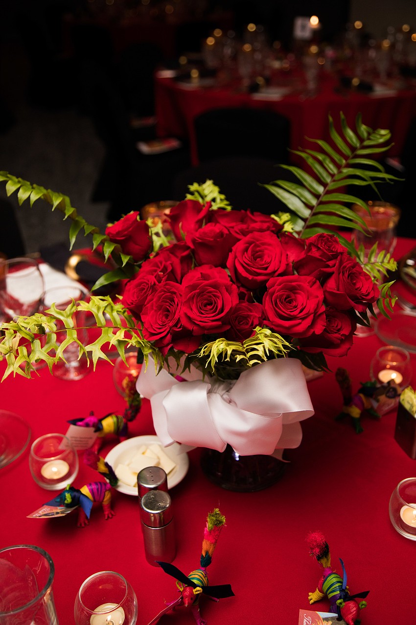 Roses centered the tables.