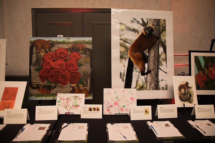 The silent auction included paintings and photographs of lemurs.