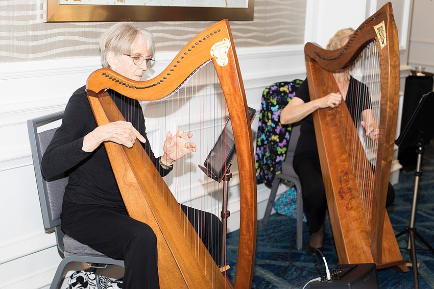 Harpists welcomed guests into The Ritz-Carlton, Sarasota.