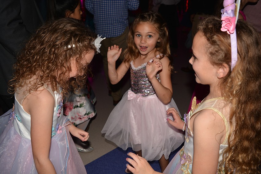 Quinn Eddy, Irelynn Ettinger and Julianna Hayes dance the night away.