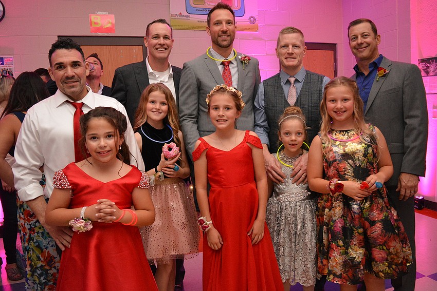 Back row: Tracey Demino, Jared Hermann, Jim Johnson, Kevin West and Ryan Barbour. Front row, left to right: Gianna Demino, Charlee Hermann, Abby Johnson, Kylie West and Sadie Barbour.