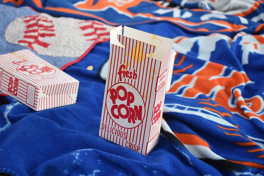 Children enjoyed popcorn during the movie.