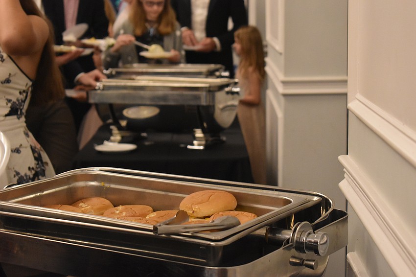 Food, such as hamburgers, were served buffet style at the event.