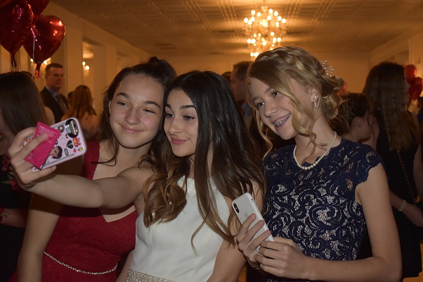 Ava Pitre, Gabby Fisher and Alexa Hornung take a selfie.