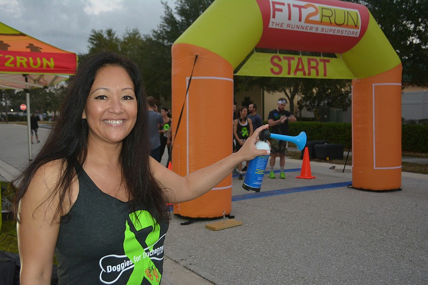 Race co-organizer Rebekah Boudrie started each race with her air horn.