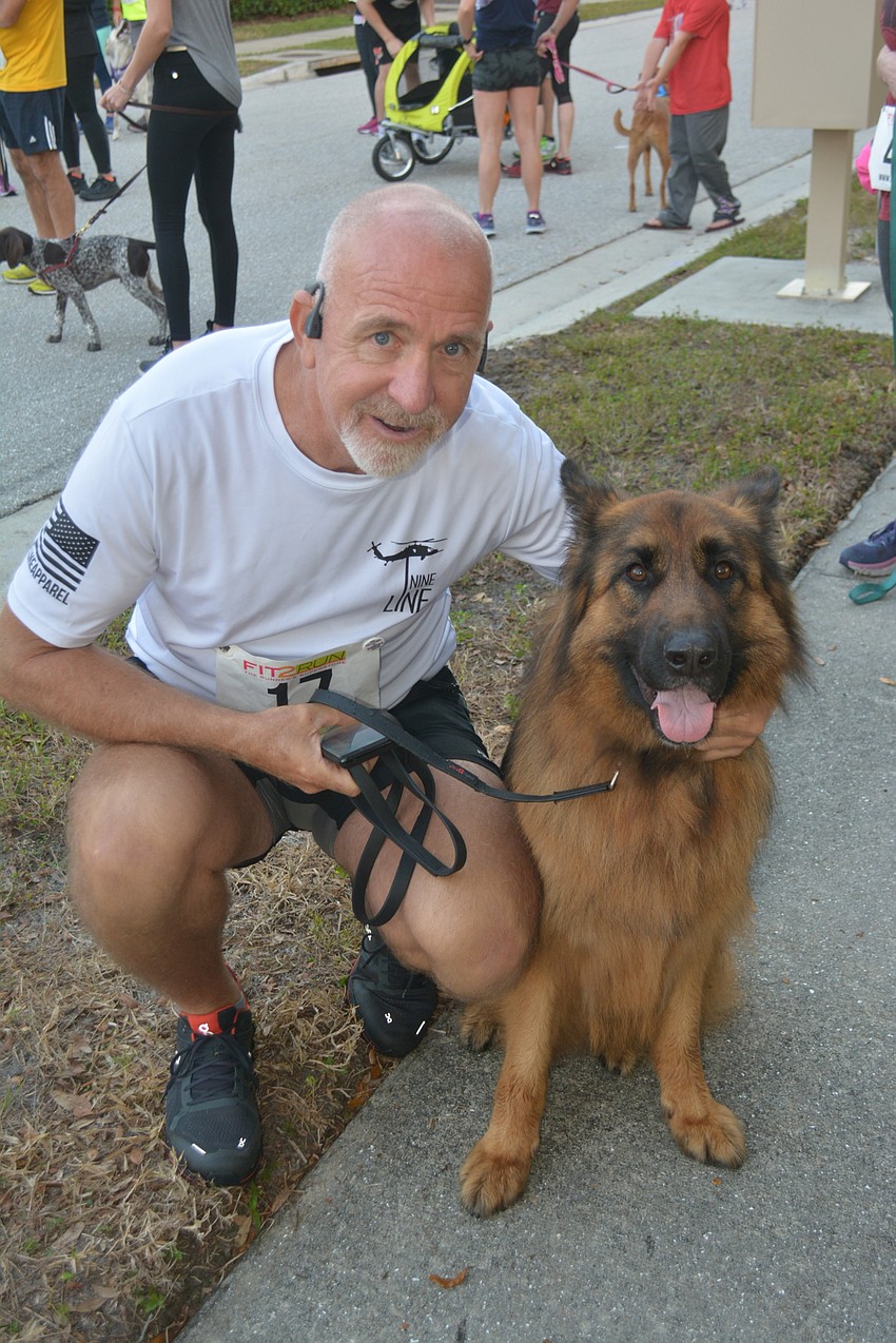Punta Gorda's Joe Smigel brought his German shepherd Maya to the race.