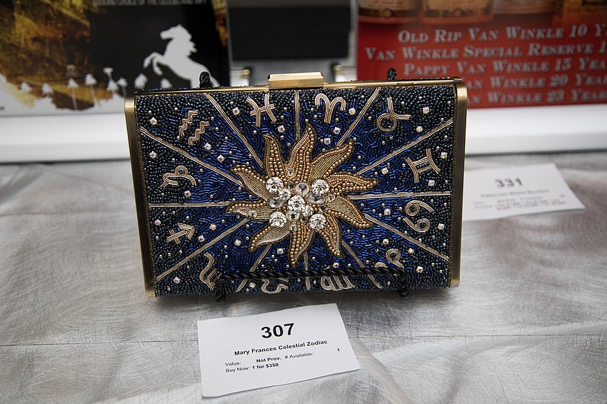 The silent auction table had a variety of items to bid on.