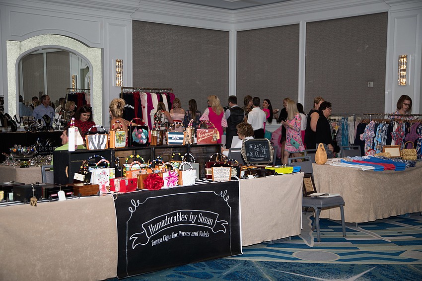 Vendors were set up at the back of the ballroom.