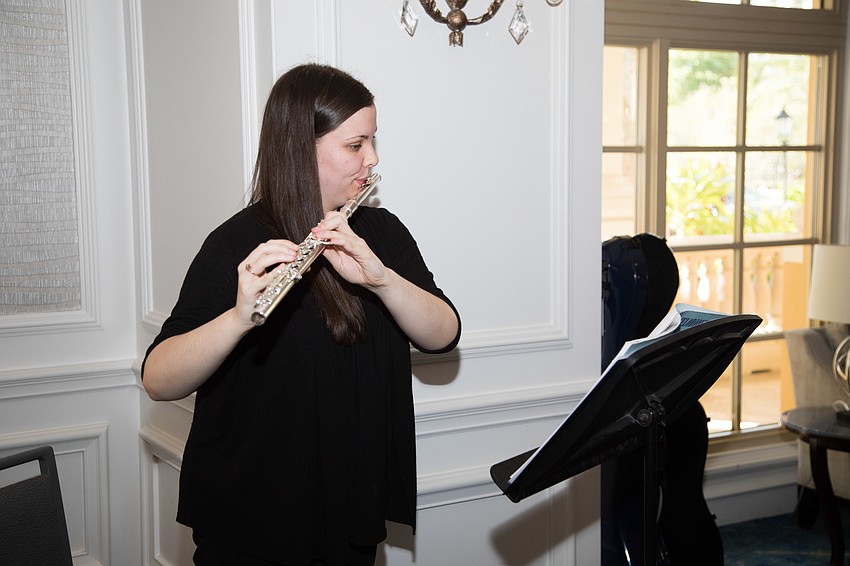 Emily Elmore played music throughout cocktail hour.