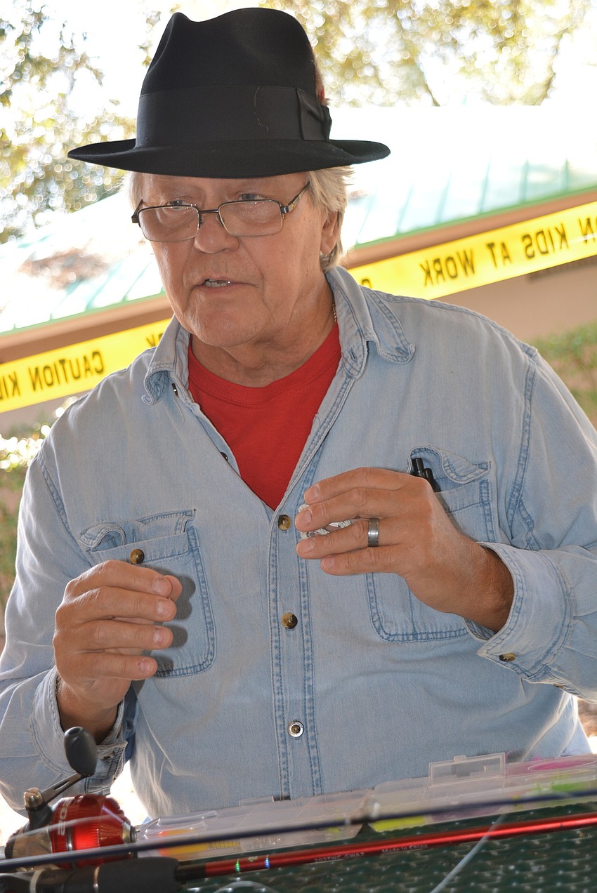 Angler Glenn Sorensen tells the children what to expect the day of the fishing tournament.