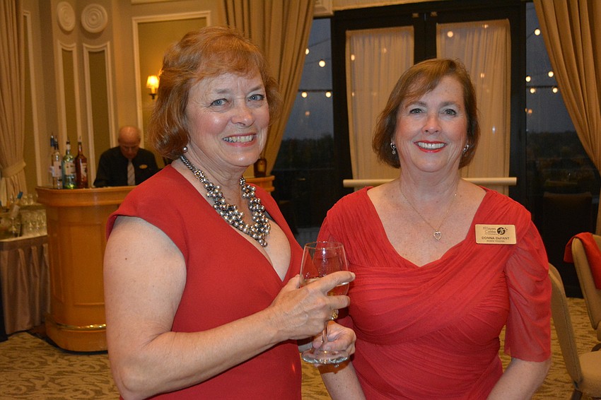 Players supporter Janet Davies visits with Players Chair Donna DeFant.