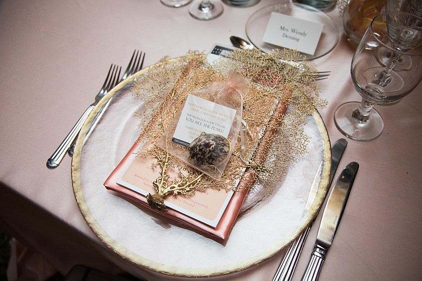 Guests received a clam shell or a piece of coral on their plate.