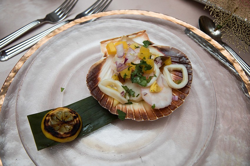 The first course was a ceviche served in a scallop shell.