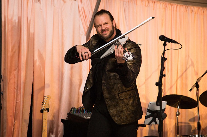 Jared Violin played music throughout dinner.