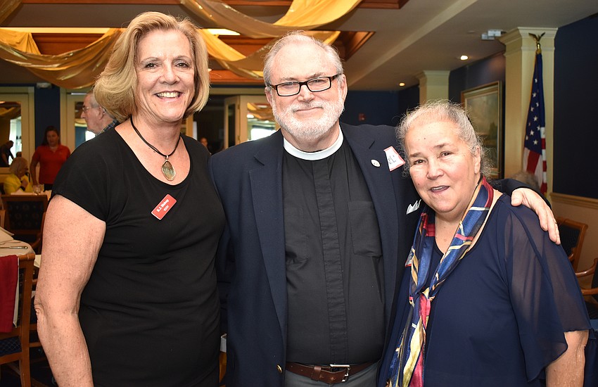 BJ Bishop, the Rev. Michael Durning and Bonnie Jean Durning